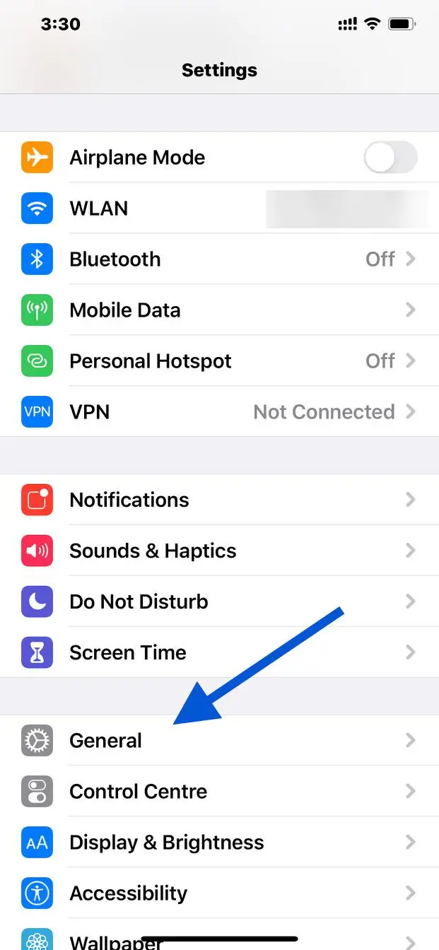iPhone Settings screen with an arrow pointing to General